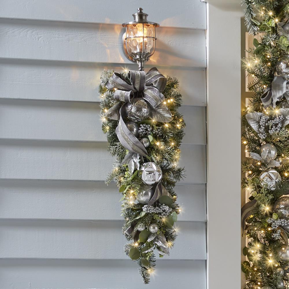 The Cordless Prelit Frosted Silver Holiday Trim ( 32″ Teardrop Sconce)  |   Wreaths & Garlands HOLIDAY Wreaths & Garlands